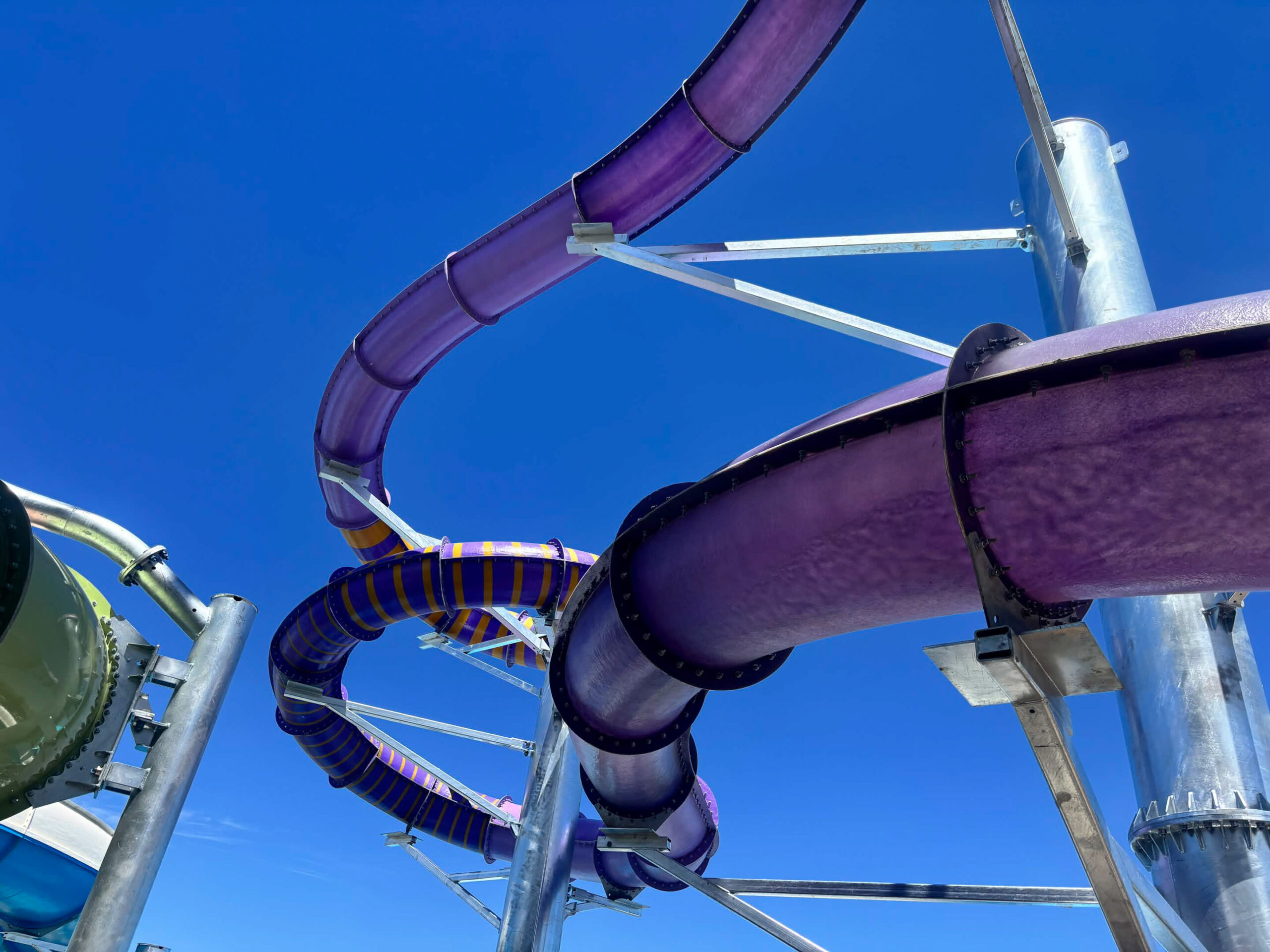 Columbine Cascade is a purple, enclosed body slide with fiberglass effects.