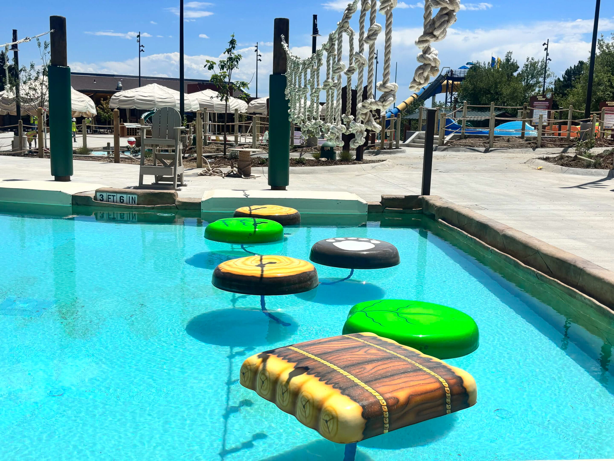 Creekside Crossing is an over-water obstacle course. Hang onto ropes and traverse floating logs and lily pads!